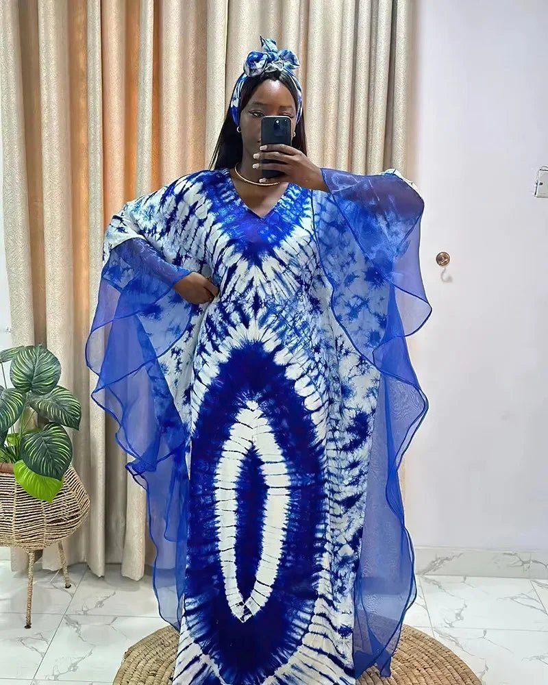 African Dashiki Ankara Maxi Long Dress for women, traditional clothing by MANDOTOS INTERNATIONAL, featuring vibrant patterns and flowing fabric.