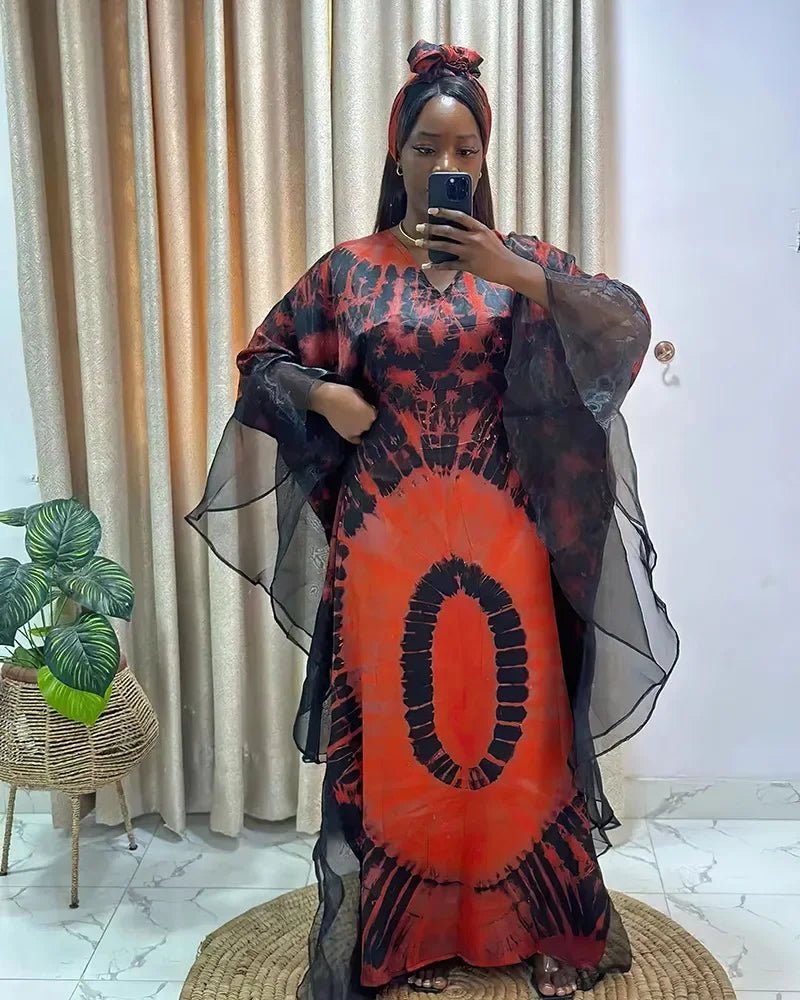 African Dashiki Ankara maxi dress for women by MANDOTOS INTERNATIONAL, featuring vibrant traditional fabric and long flowing design.