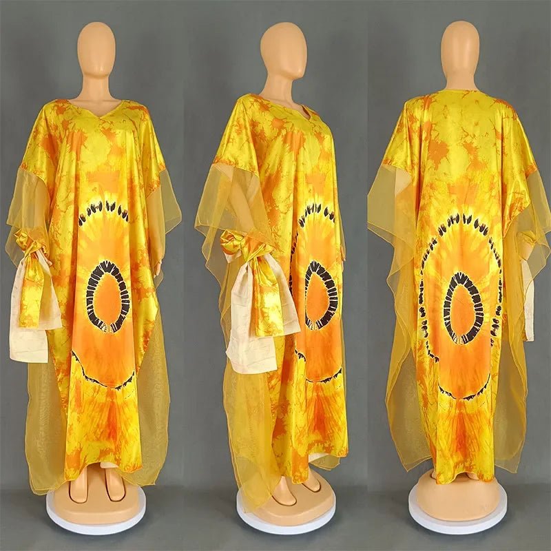 African Dashiki Ankara maxi dress for women, traditional long clothing with vibrant patterns by MANDOTOS INTERNATIONAL.