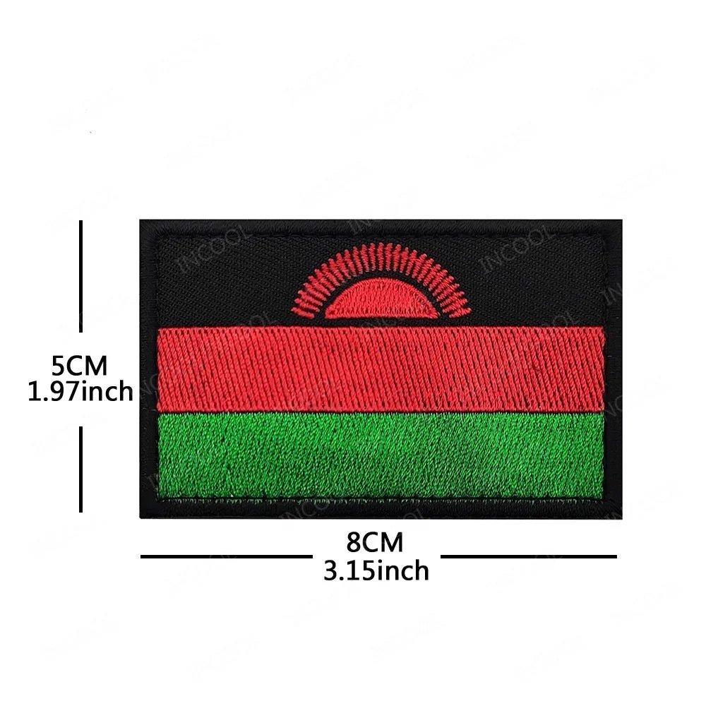 Embroidery patches of African flags and badges from Morocco, Nigeria, Gabon, Libya, and Namibia by MANDOTOS INTERNATIONAL.