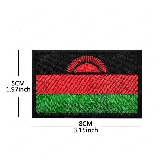 Embroidery patches of African flags and badges from Morocco, Nigeria, Gabon, Libya, and Namibia by MANDOTOS INTERNATIONAL.