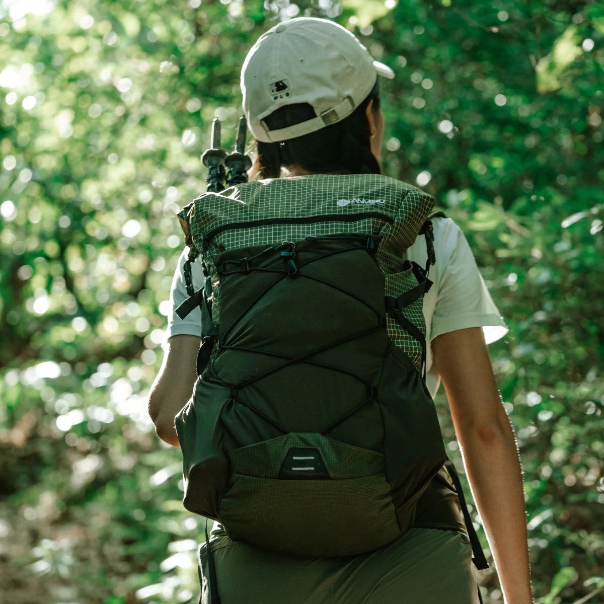 Large nylon backpack by Mandotos International, ideal for mountain camping, travel, and hiking with spacious capacity and durable design.