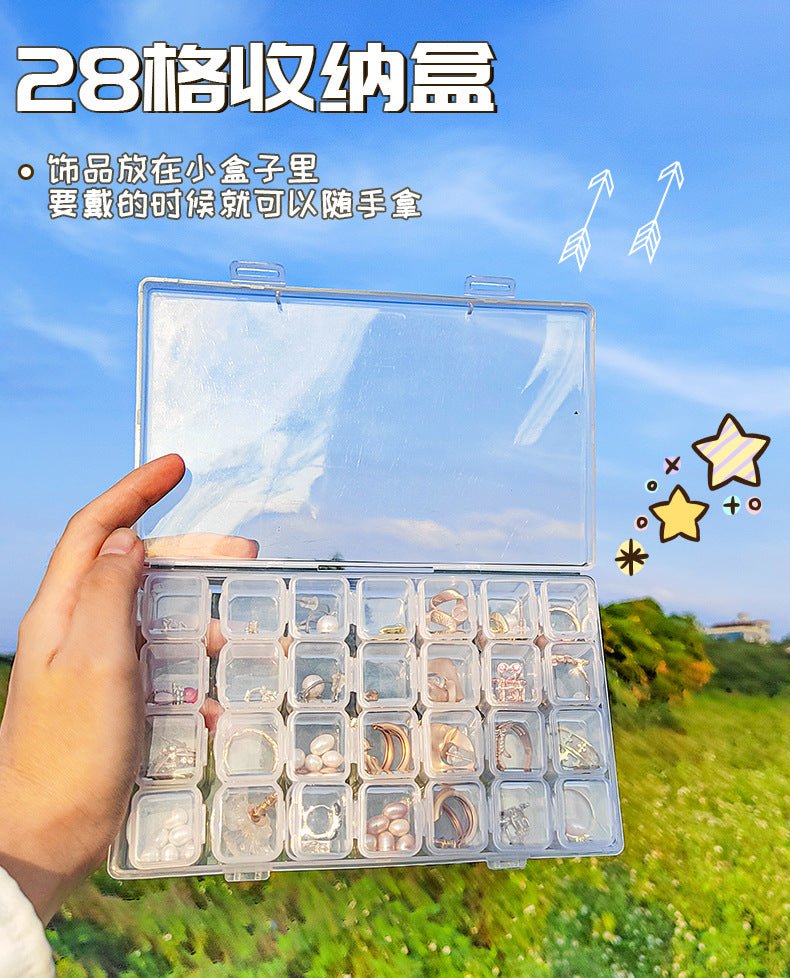 Mandotos International anti-oxidation multi-compartment jewelry storage box with organized sections for necklaces, rings, and earrings.