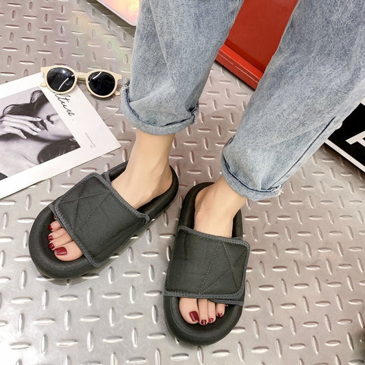 Chic grey beach sandals with comfort sole from MANDOTOS INTERNATIONAL, featuring a stylish design and cushioned footbed for easy wear.