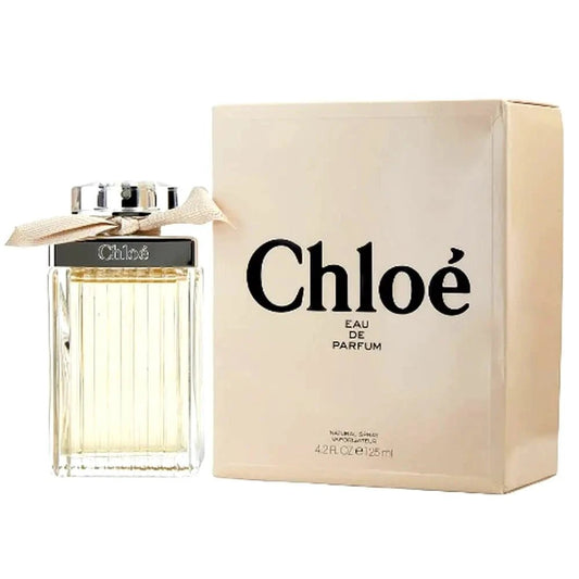 Chloe Essence women's perfume 4.2 oz bottle by Mandotos International, elegant glass container with floral design.