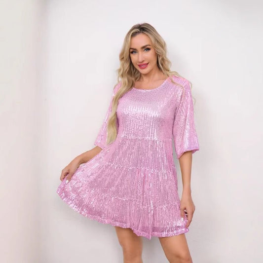 Sequin dress by MANDOTOS INTERNATIONAL featuring European and US style, with glittering sequins and elegant design.