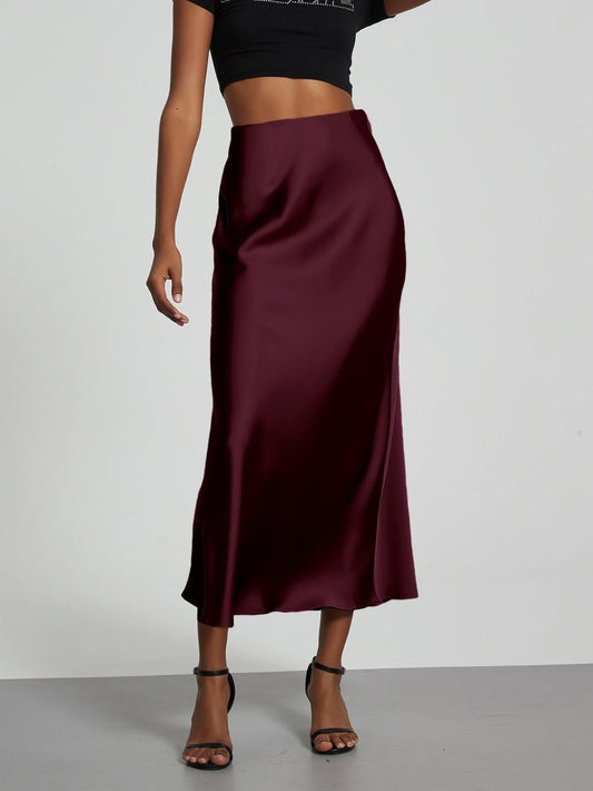 European American style satin midi skirt by MANDOTOS INTERNATIONAL, featuring smooth fabric and a classic midi length.
