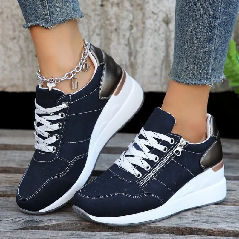 Fashionable lace-up sneakers with zipper detail and medium heel height by MANDOTOS INTERNATIONAL, showcasing stylish footwear for trendy outfits.