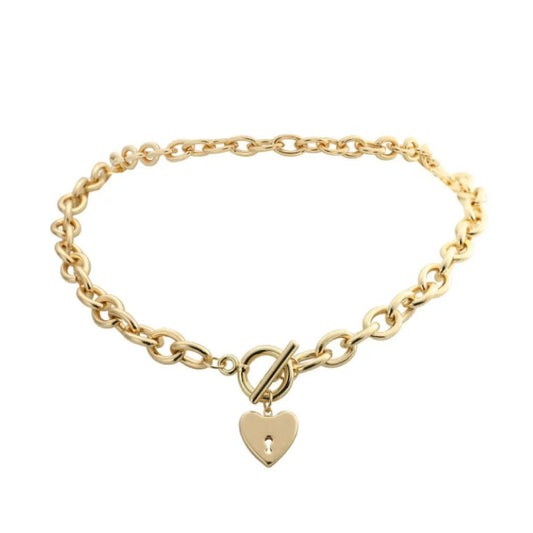Mandotos International Heart Key Toggle Necklace featuring a silver heart-shaped key pendant on a delicate chain