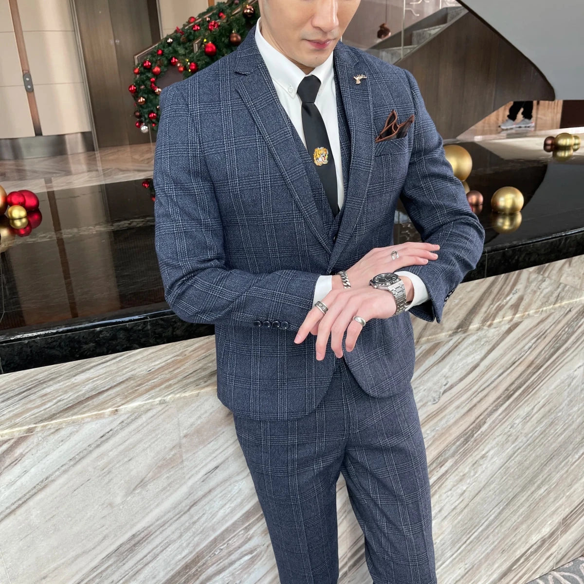 High-quality British Korean style plaid men's 3-piece business casual suit set by MANDOTOS INTERNATIONAL, featuring a blazer, vest, and trousers.