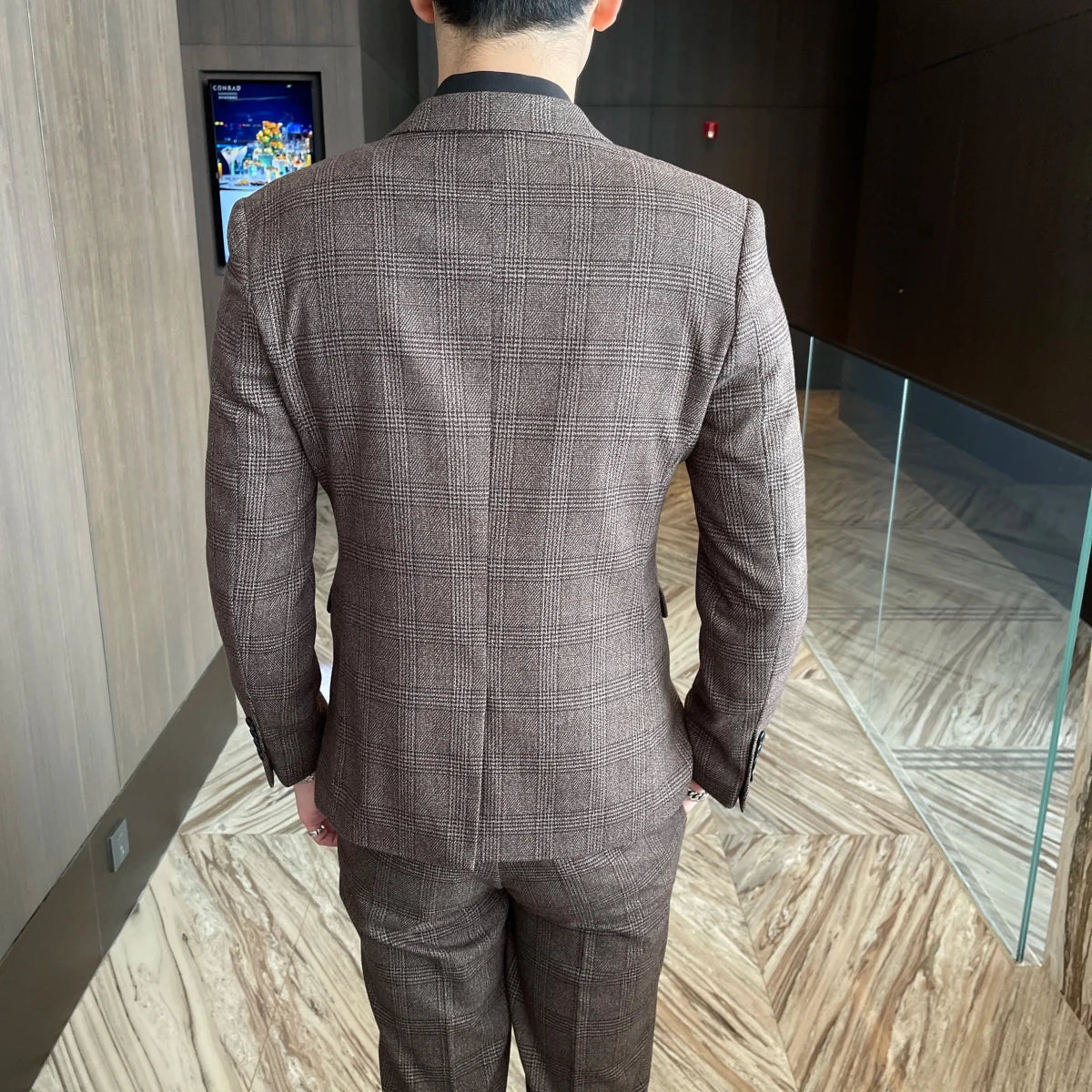 British Korean style plaid men's 3-piece business casual suit set by MANDOTOS INTERNATIONAL, featuring tailored jacket, vest, and trousers.
