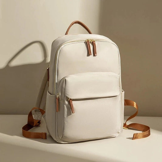 Mandotos International waterproof laptop backpack with multiple compartments, designed for business travel and everyday use.