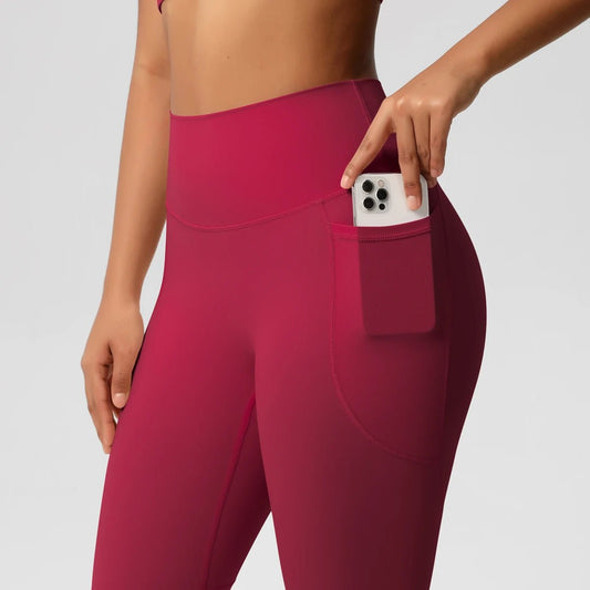 Mandotos International high waist women's stretch yoga leggings with pockets, push-up fit, ideal for fitness, running, and sports.