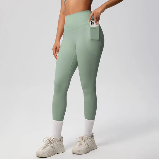 Mandotos high waist women's stretch yoga leggings with pockets, push-up fit, solid color, ideal for fitness, running, and sports.