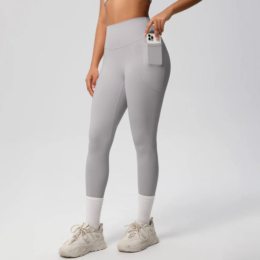 Mandotos International high waist women's leggings with pockets, stretch yoga pants, push-up fit, ideal for fitness and running.