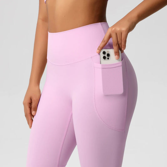 Mandotos high waist women's stretch yoga leggings with pockets, push-up fit, ideal for fitness, running, and sports in solid color.