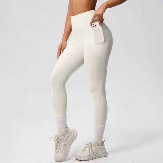 High waist women's Mandotos International leggings with stretch fabric, pockets, and push-up design for yoga, running, and fitness.