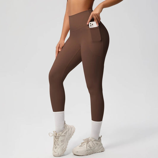 Mandotos International high waist women's stretch yoga leggings with pockets, push-up design, ideal for fitness and running.