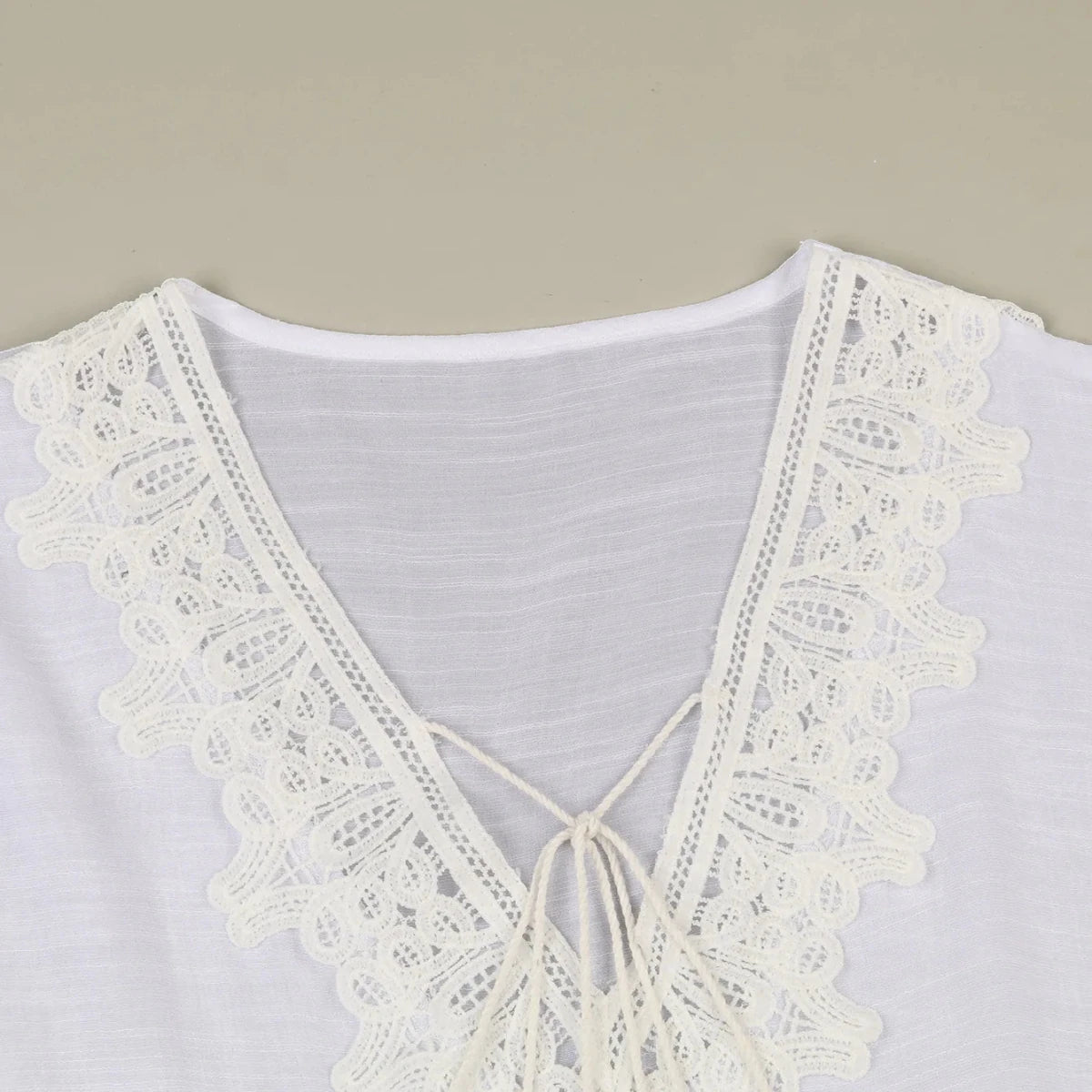 Mandotos International JSN9202262 lace bikini cover-up for girls, V-neck solid color blouse, high-quality and stylish for summer wear.