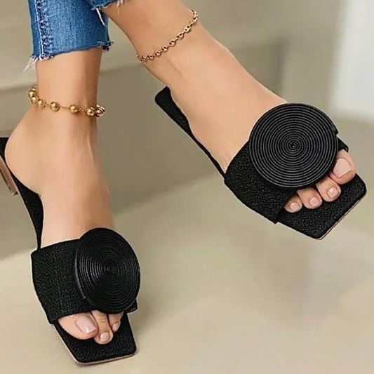 Luxury Korean style crystal beach slippers by MANDOTOS INTERNATIONAL, flat casual sandals with large size button detail.