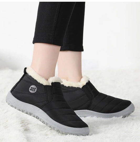 Men's waterproof winter snow boots by MANDOTOS INTERNATIONAL, outdoor work shoes in plus size with rugged traction and insulated lining.