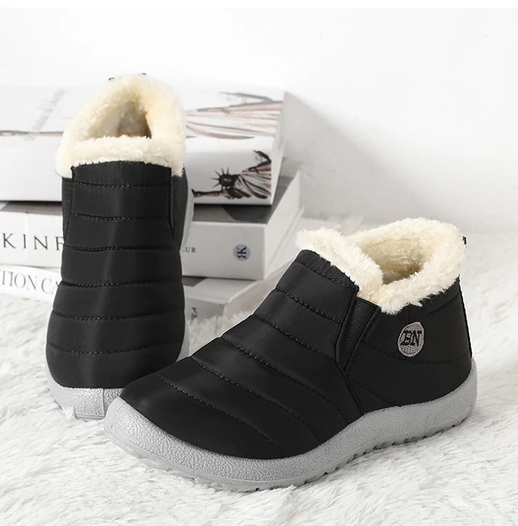 Men's waterproof winter snow boots by MANDOTOS INTERNATIONAL, outdoor work shoes with sturdy soles and plus-size fit.