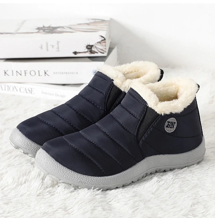 Men's waterproof winter snow boots by MANDOTOS INTERNATIONAL, outdoor work shoes in plus size with rugged sole and insulated design.