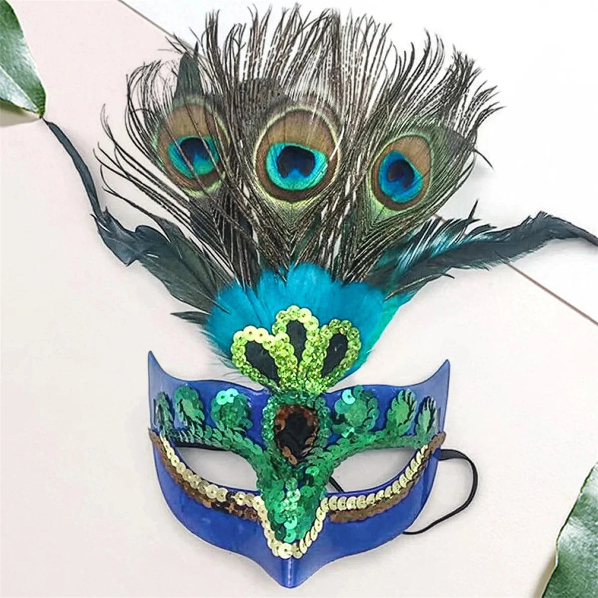 Peacock feather headpiece for women, ideal for Halloween, Mardi Gras, carnival, and cosplay events, by MANDOTOS INTERNATIONAL.
