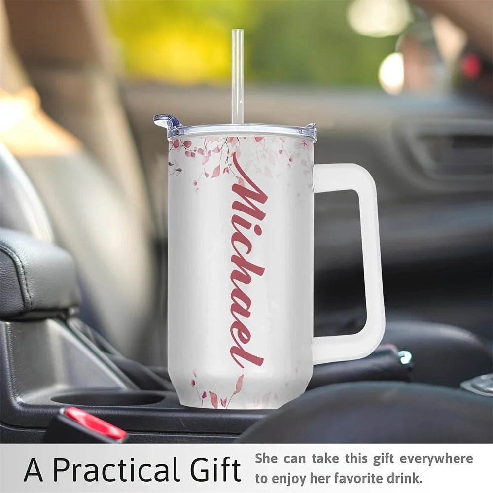 Personalized 40oz stainless steel travel coffee mug with handle by MANDOTOS INTERNATIONAL, featuring a sleek design and durable construction.