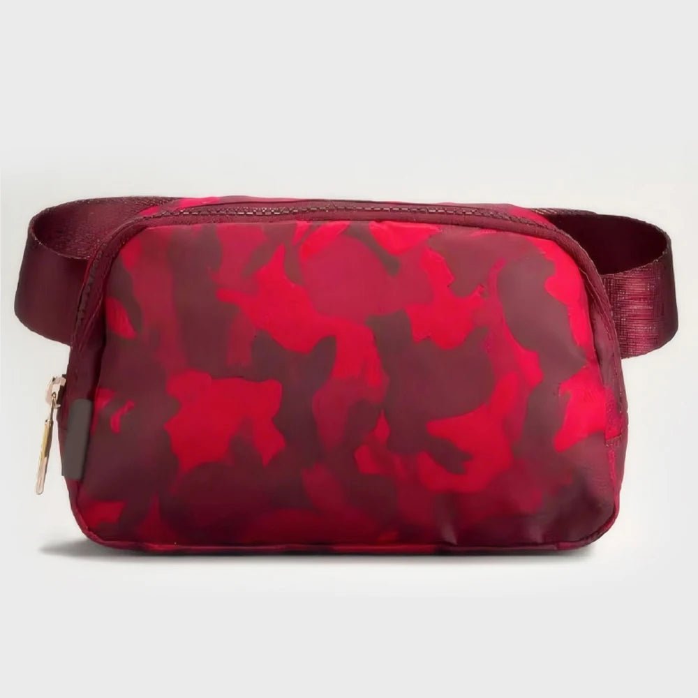 Mandotos International lightweight women's waist bag for running and travel, shown in black with adjustable strap and secure zipper.