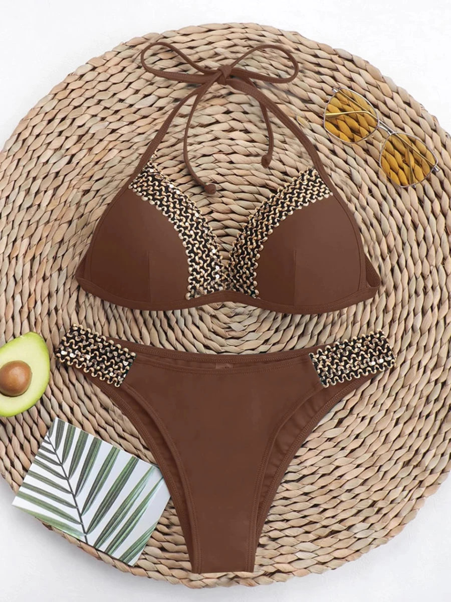 Push-up bikini set for women with thong design, halter neck, Brazilian style, from MANDOTOS INTERNATIONAL, ideal for beach swimming.