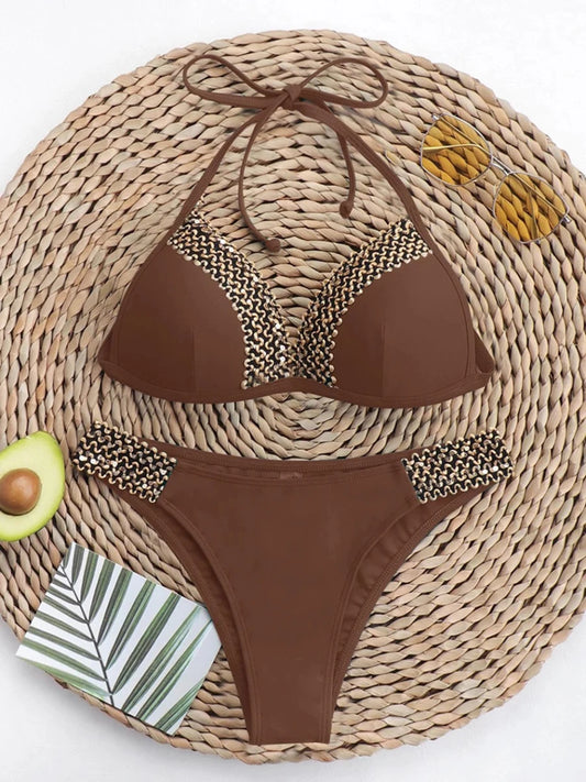 Push-up bikini set for women with thong design, halter neck, Brazilian style, from MANDOTOS INTERNATIONAL, ideal for beach swimming.