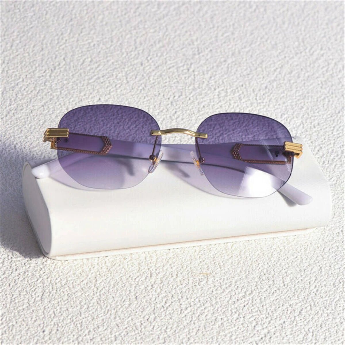 Retro square hip hop sunglasses with gold rimless frames, unisex fashion sunglasses by MANDOTOS INTERNATIONAL.