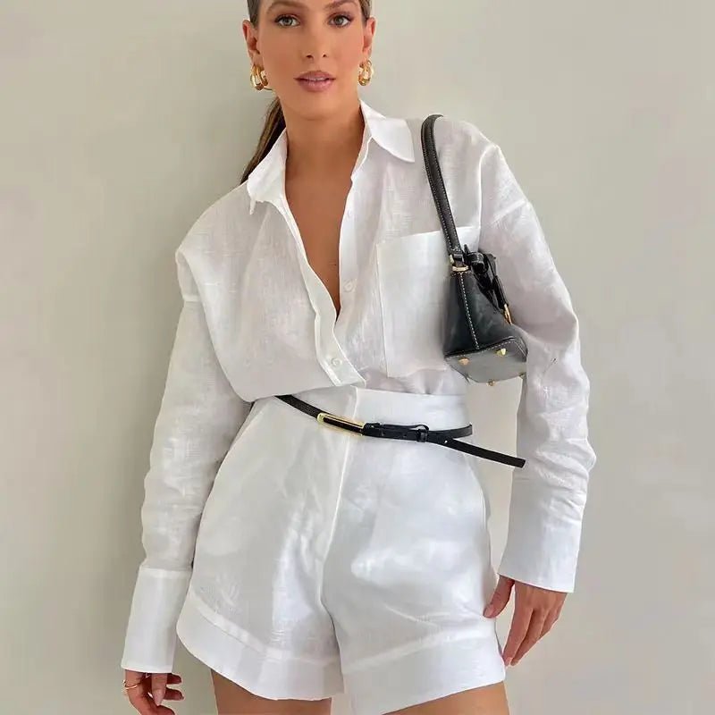 Summer fashion women's 2-piece short pant set with button details and shirt tops by MANDOTOS INTERNATIONAL, styled for warm weather.