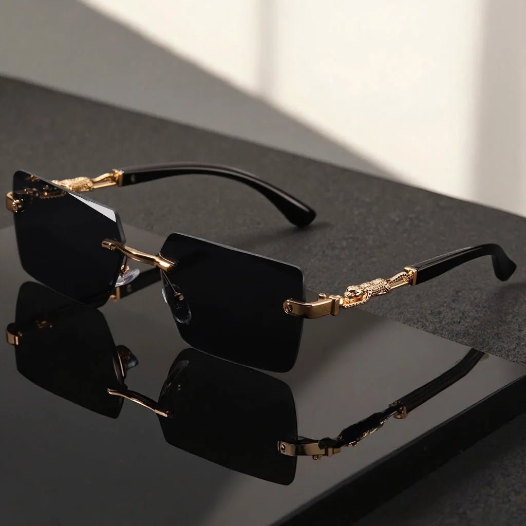 Unisex luxury frameless black and gold sunglasses with leopard print, UV400 protection, thin rectangular lenses, elegant design.