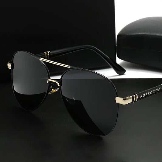 Unisex polarized stylish eyewear by Mandotos International, suitable for travel and driving, with sleek frame and tinted lenses.