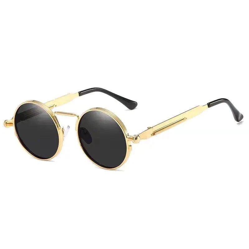 Vintage steampunk circular sunglasses by MANDOTOS INTERNATIONAL with metal frames and tinted lenses.
