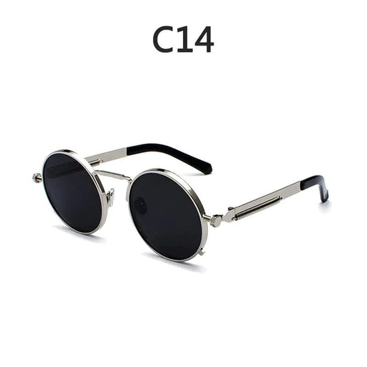 Vintage steampunk circular shades from MANDOTOS INTERNATIONAL with metal frames and tinted lenses perfect for a retro look.