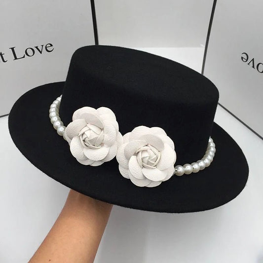 Vintage wool boater hat with pearl flower decor, classic British-style fedora for women by MANDOTOS INTERNATIONAL.
