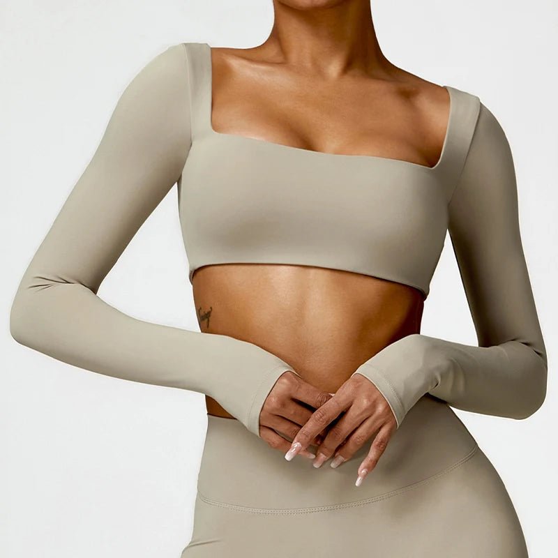 Women's long sleeve fitness T-shirt from MANDOTOS INTERNATIONAL, designed for gym workouts and push-up support.