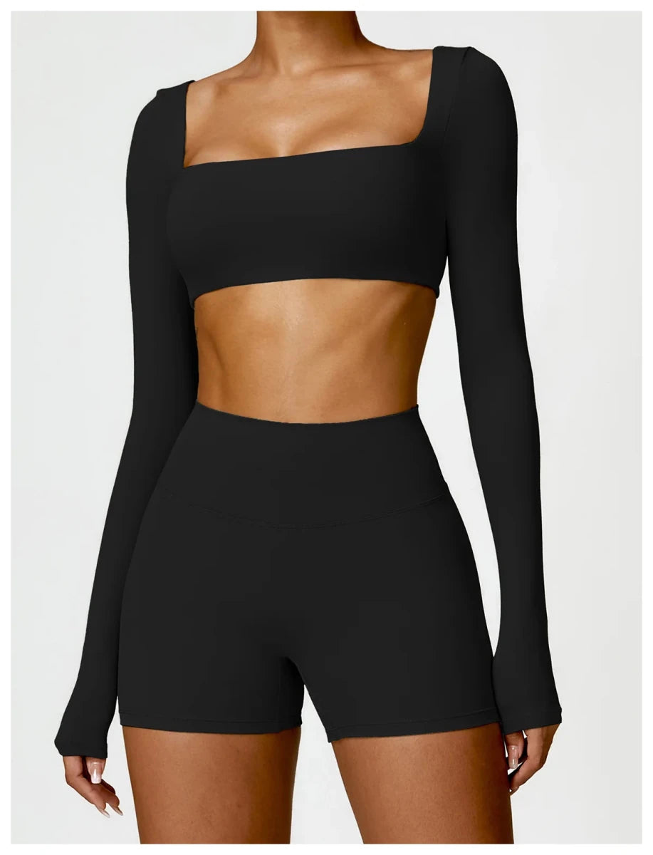 Women's long sleeve fitness T-shirt by MANDOTOS INTERNATIONAL, gym-ready push-up top, designed for active wear and comfortable movement.
