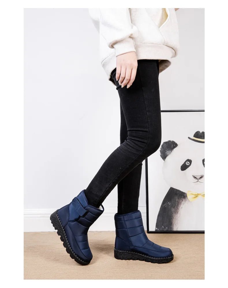 Women's waterproof winter snow boots by MANDOTOS INTERNATIONAL with non-slip soles and warm platform design.