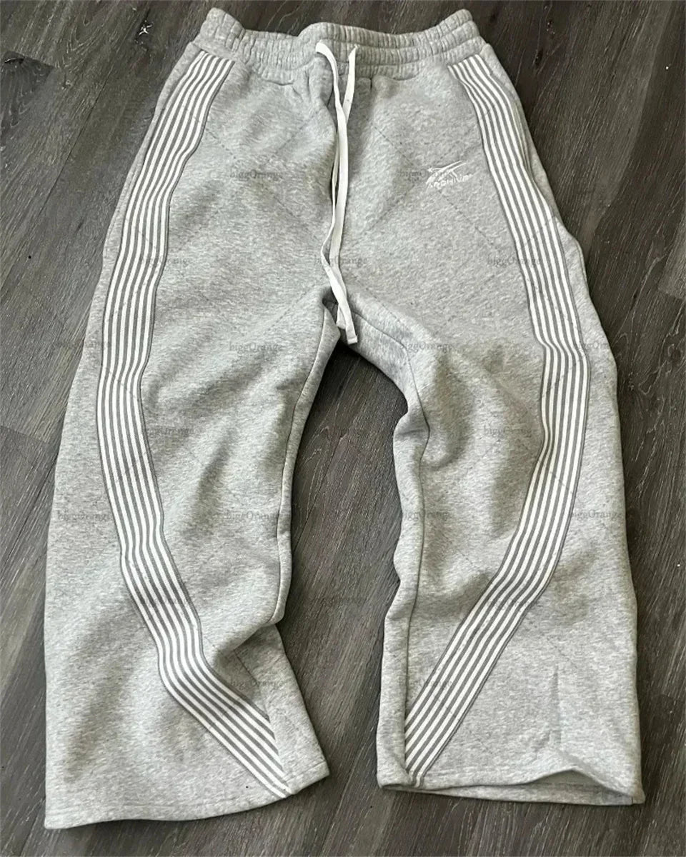 Mandotos International Y2K embroidered black gray camo tactical jogger pants with drawstring for men and women.