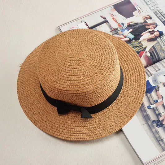Mandotos Island Breeze Boater hat with wide brim, lightweight straw material, and decorative ribbon for sun protection and style