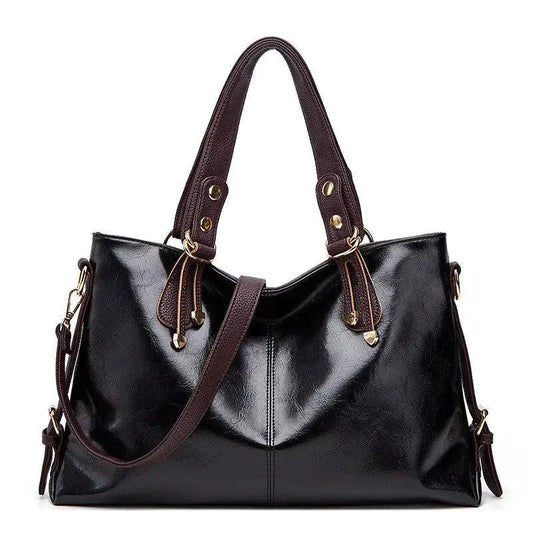 Mandotos Kathie leather tote purse with sturdy handles and spacious interior, showcasing a stylish, high-quality leather design.