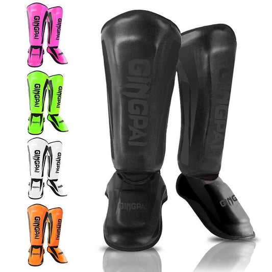 Mandotos kickboxing shin guards and Muay Thai leg protectors showing padded design and adjustable straps for secure fit.