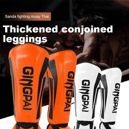 Mandotos kickboxing shin guards for Muay Thai, padded leg protectors for kickboxing training and competition.