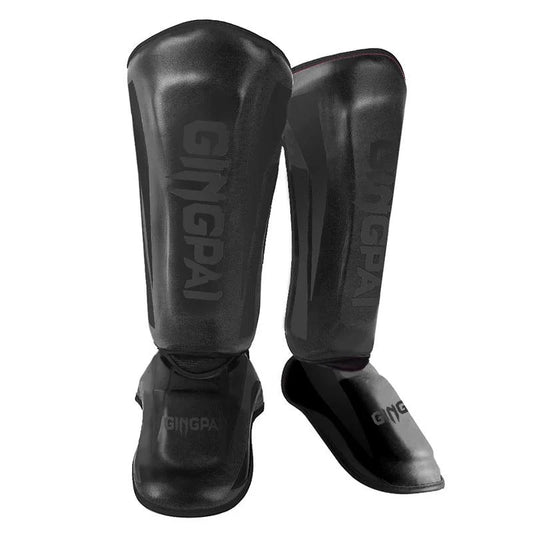 Mandotos kickboxing shin guards and Muay Thai leg protectors with padded design for secure leg protection during training.