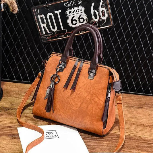 Luxury MANDOTOS ladies' crossbody handbag with sleek design, perfect for women’s fashion and everyday use.