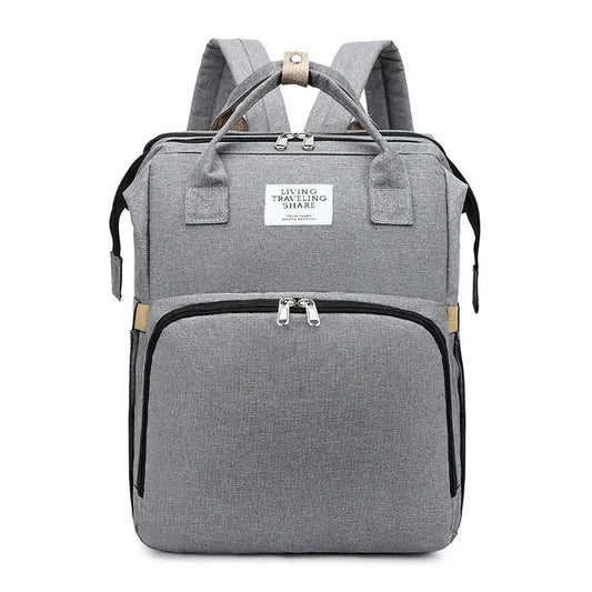 Large-capacity MANDOTOS mommy bag with multiple pockets and adjustable straps, designed for moms to organize essentials.